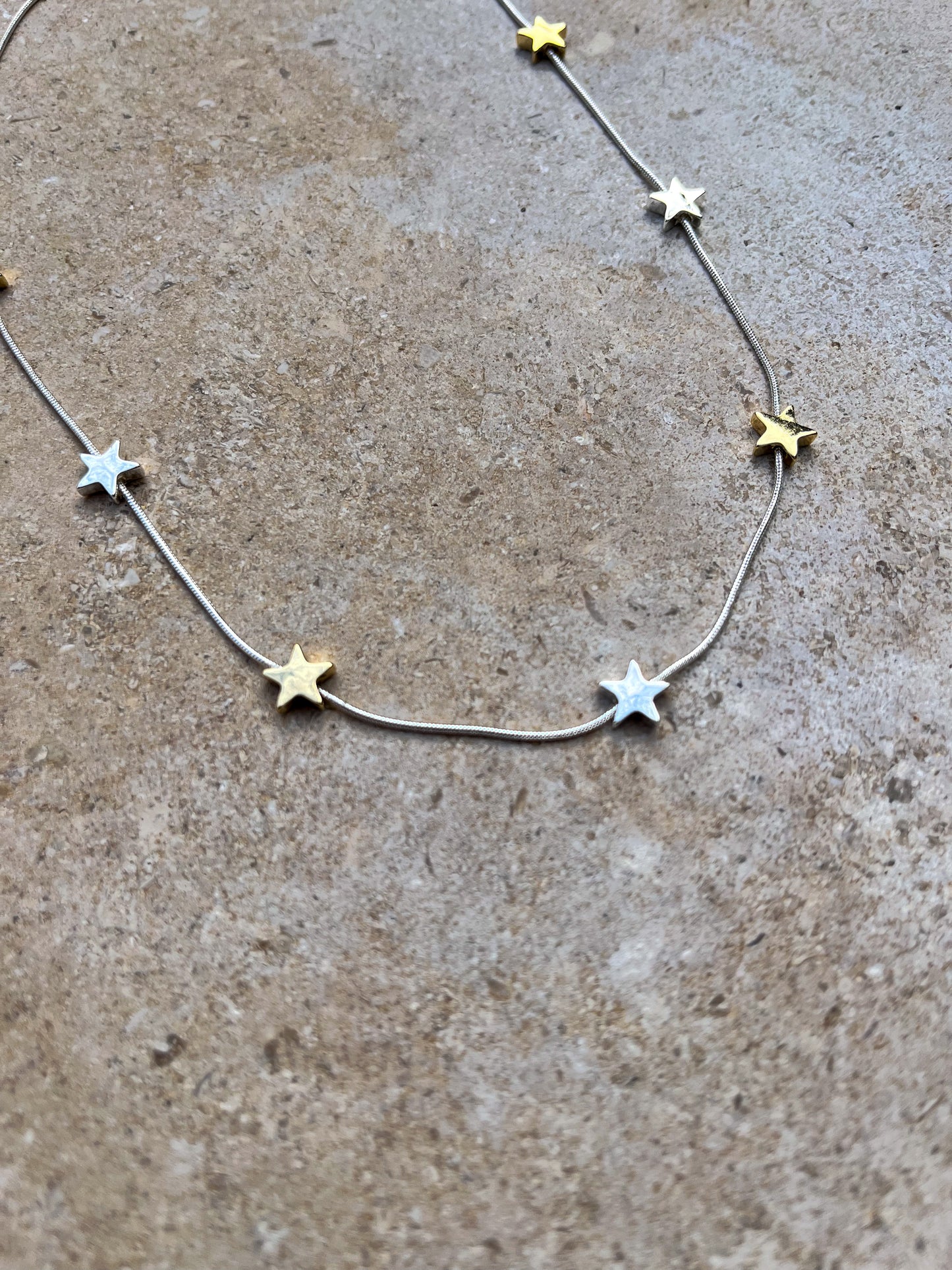 Star gold and silver charm necklace