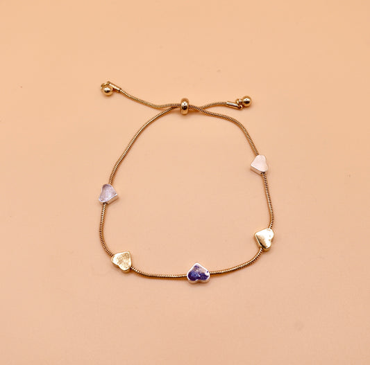 Gold and silver heart bracelet in gold