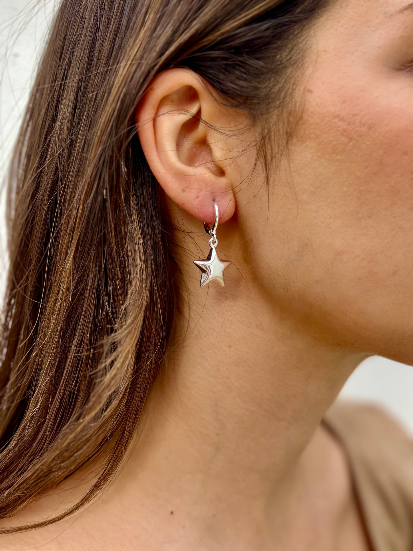Huggie Star earrings in silver