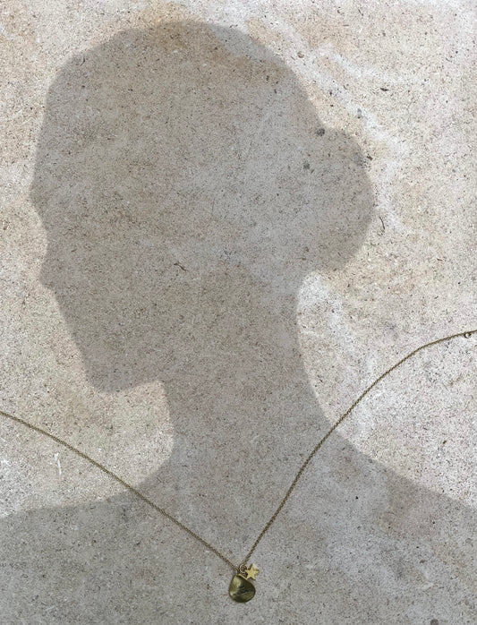 "One in a million" gold charm necklace