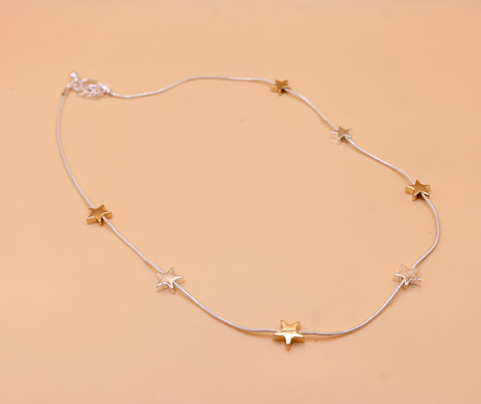 Star gold and silver charm necklace
