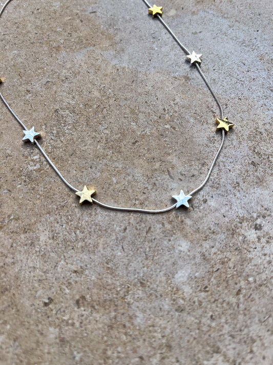 Star gold and silver charm necklace