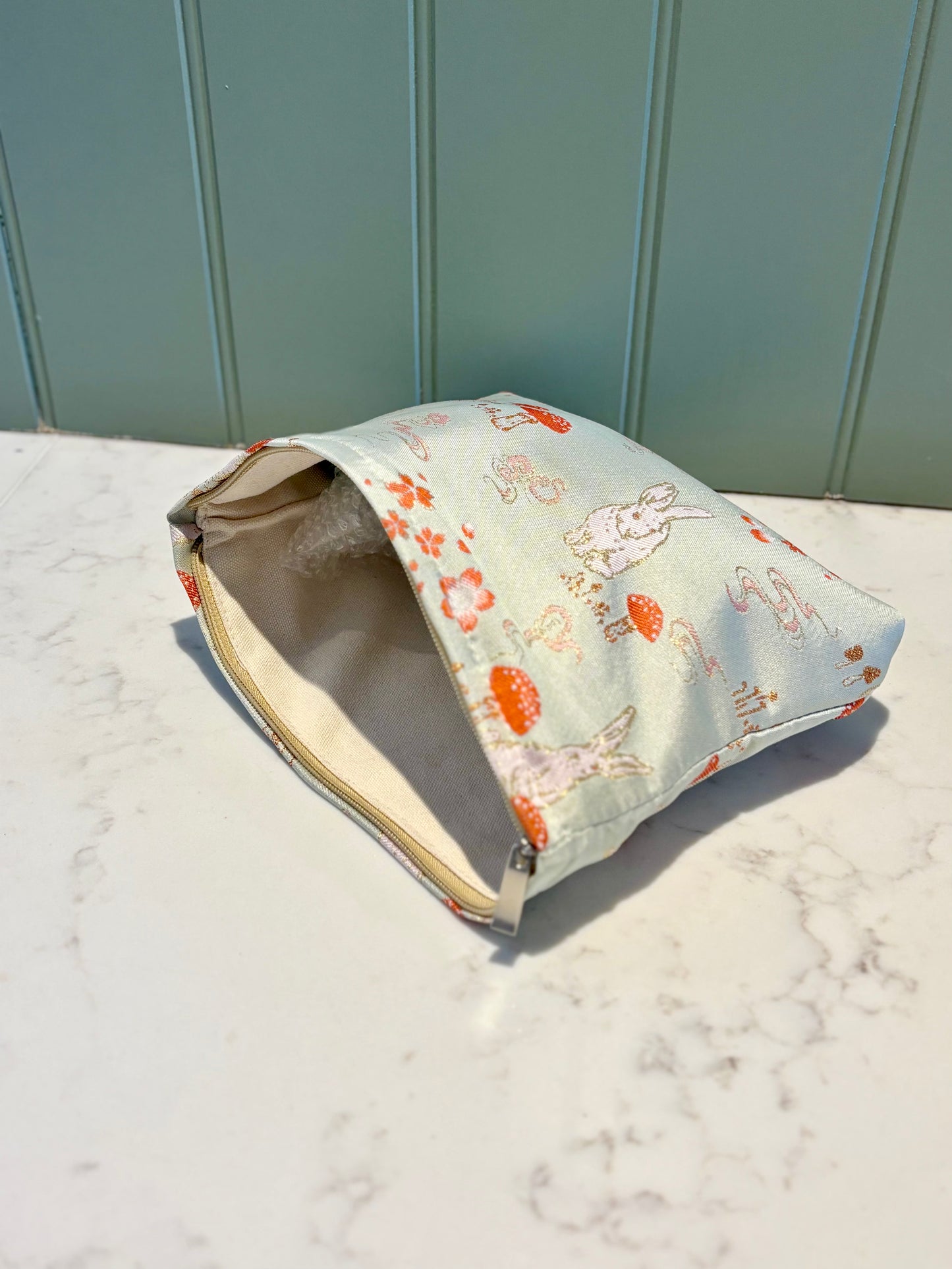 Woodland makeup bag in blue