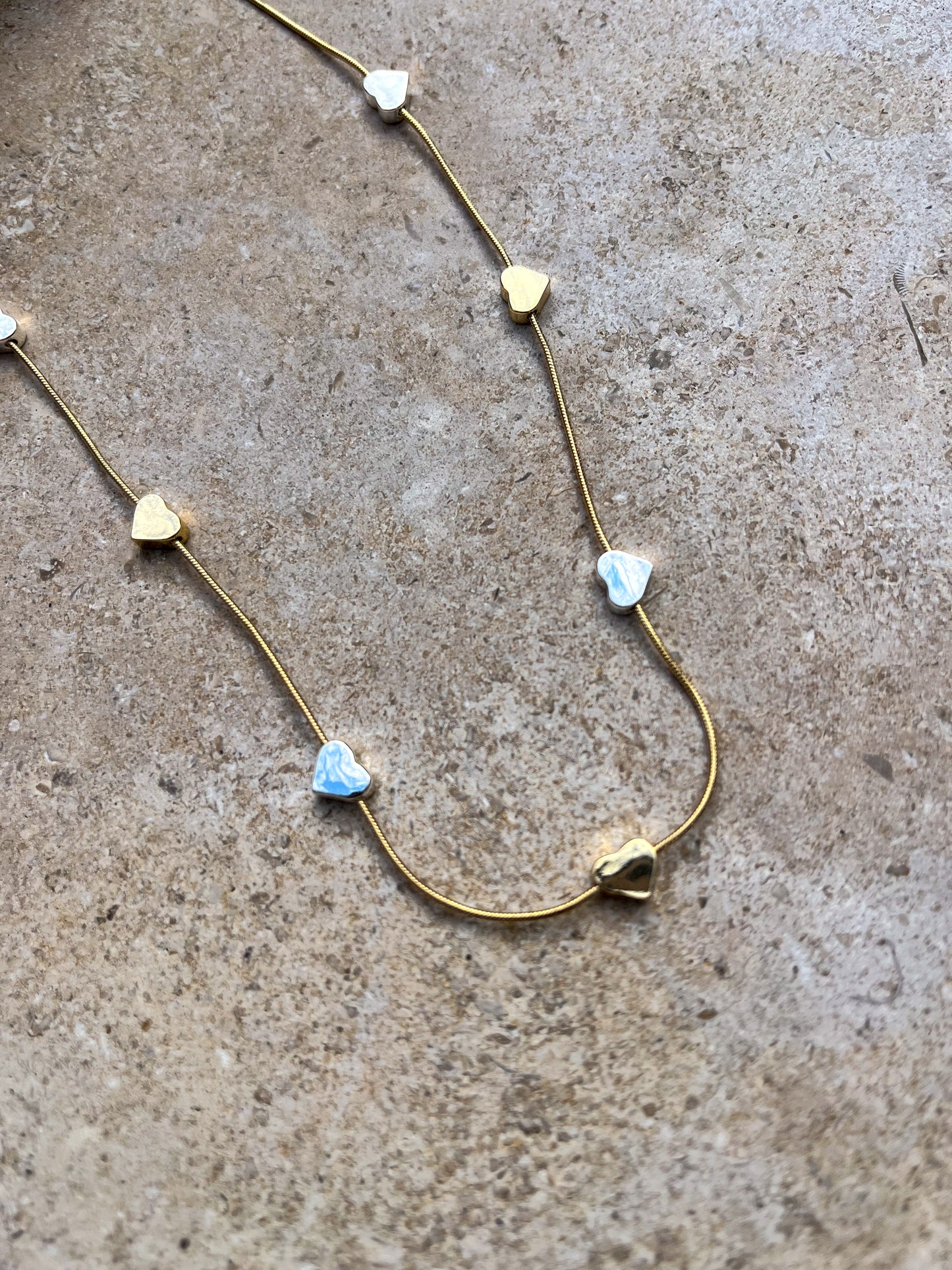 Heart gold and silver charm necklace